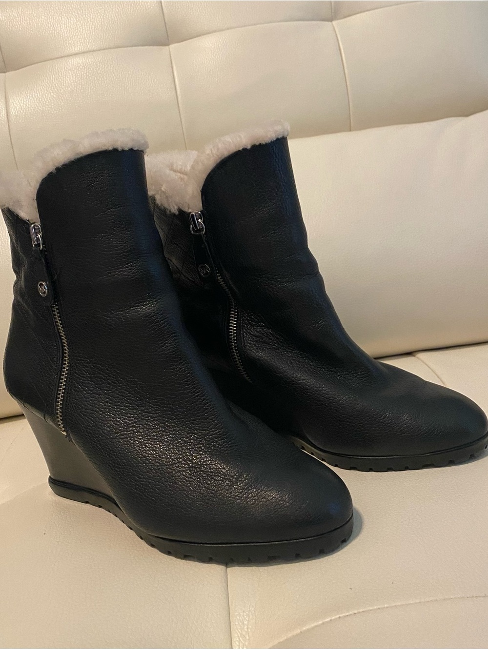 Michael Kors Black Leather Wedge Ankle Boots with Shearling Trim all through.